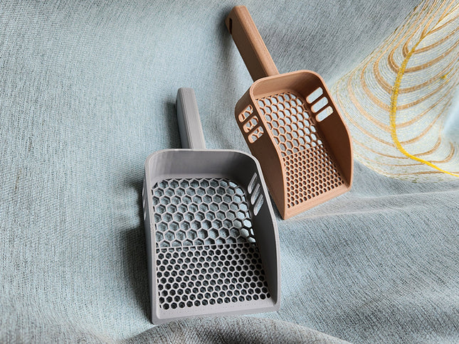 Universalus kačių kraiko semtuvėlis