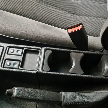 BMW E34 puodelių laikiklis