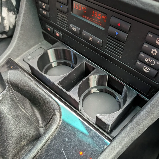 BMW E39 centrinės konsolės puodelių laikiklis ir dėtuvė