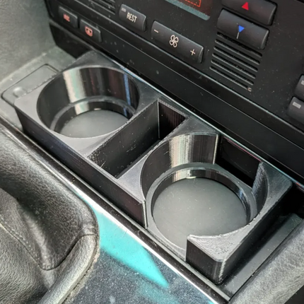 BMW E39 centrinės konsolės puodelių laikiklis ir dėtuvė