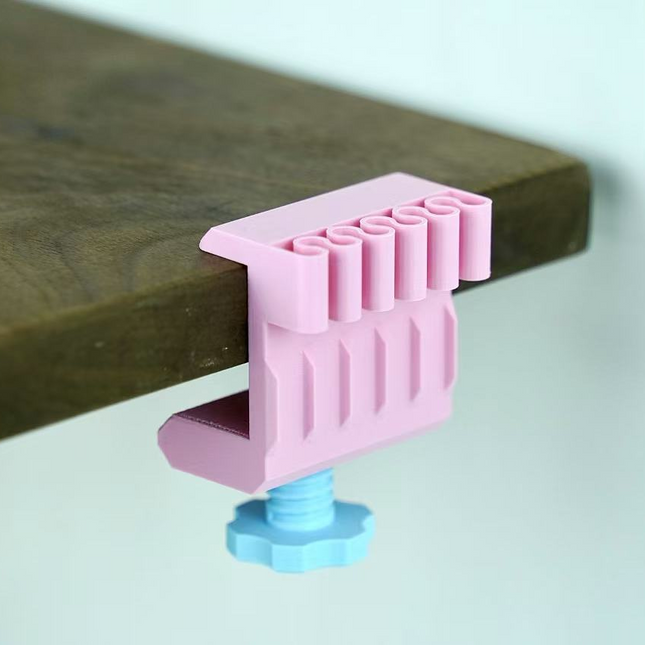 Stalo kraštinės kabelių laikiklis