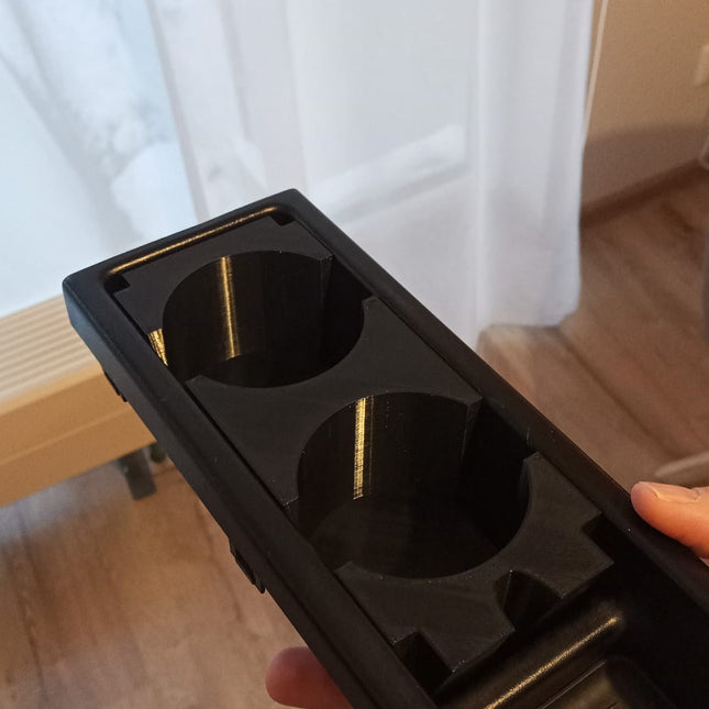 BMW E46 dvigubas puodelių laikiklis