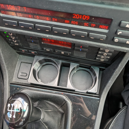 BMW E39 puodelių laikiklis