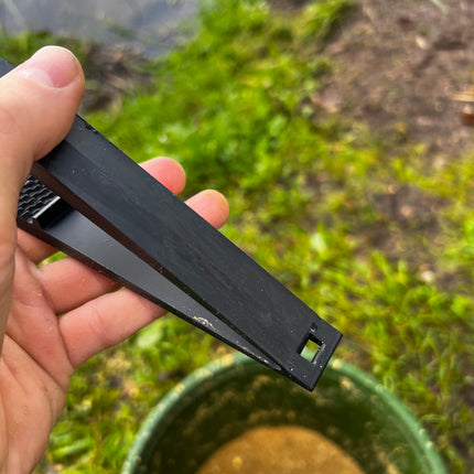 Žuvies žnyplės greitam kabliuko išėmimui