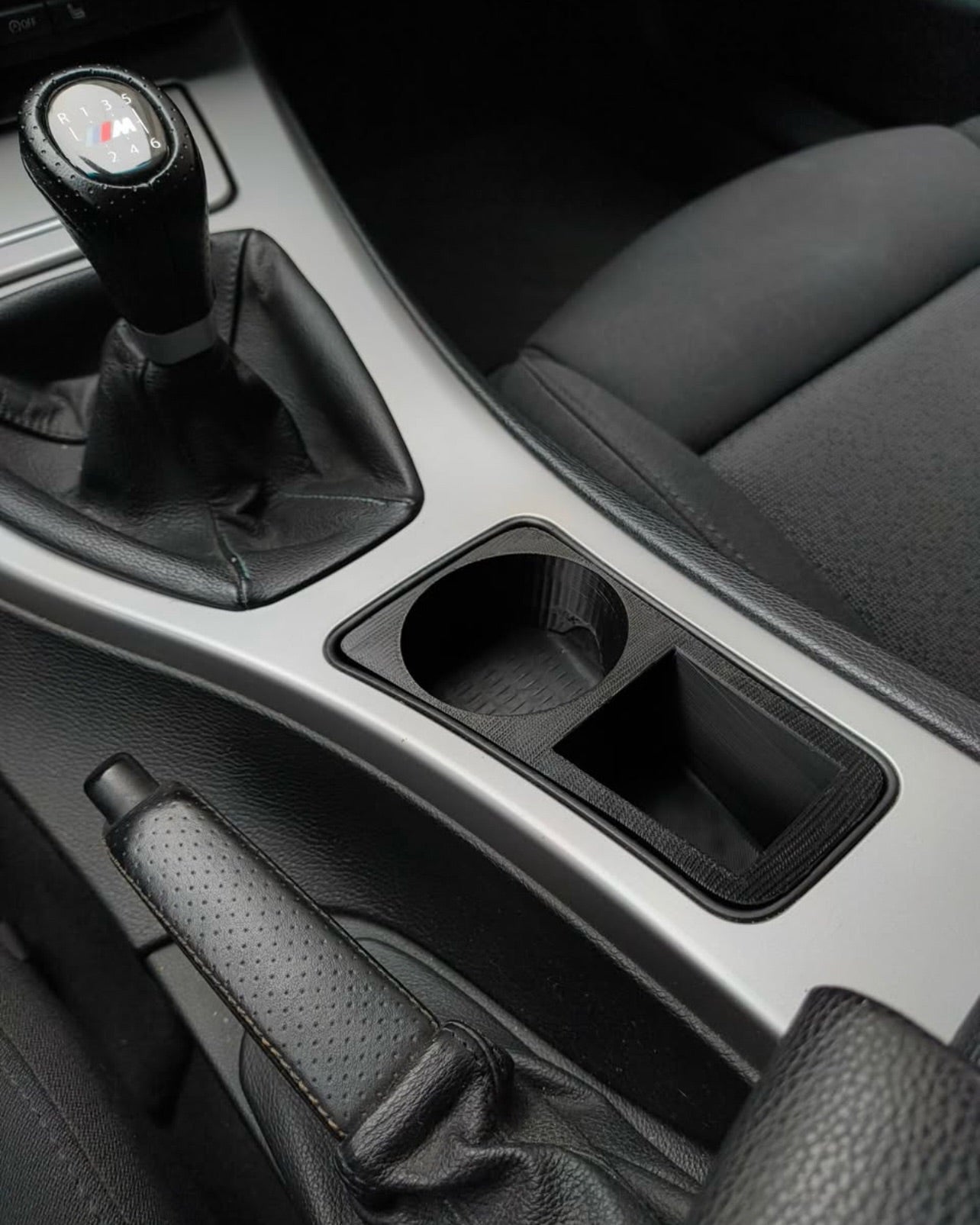BMW E90 centrinės konsolės puodelių laikiklis