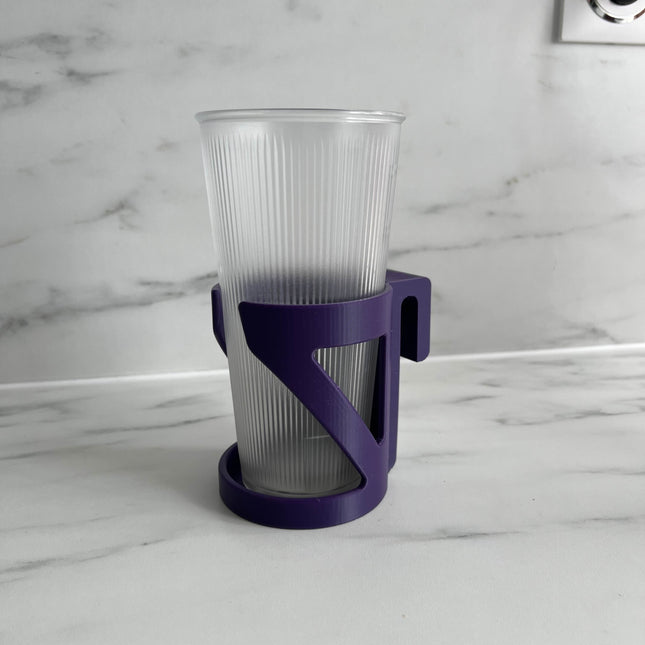 Universalus puodelių laikiklis automobiliams