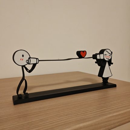 „Connected Hearts“ – Žaisminga Įsimylėjėlių Figūrėlė