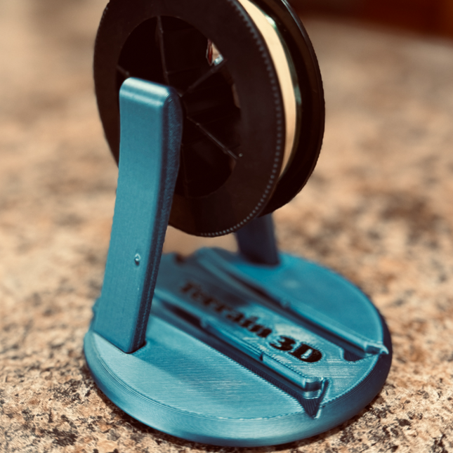 Kompaktiškas laikiklis valo sukimui ant ritės