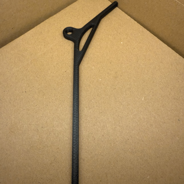 Inline sistemos anti-tangle laikiklis