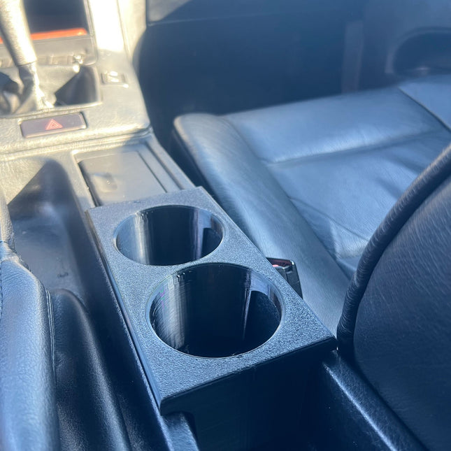 BMW E36 puodelių laikiklis (išskyrus Compact modelius)