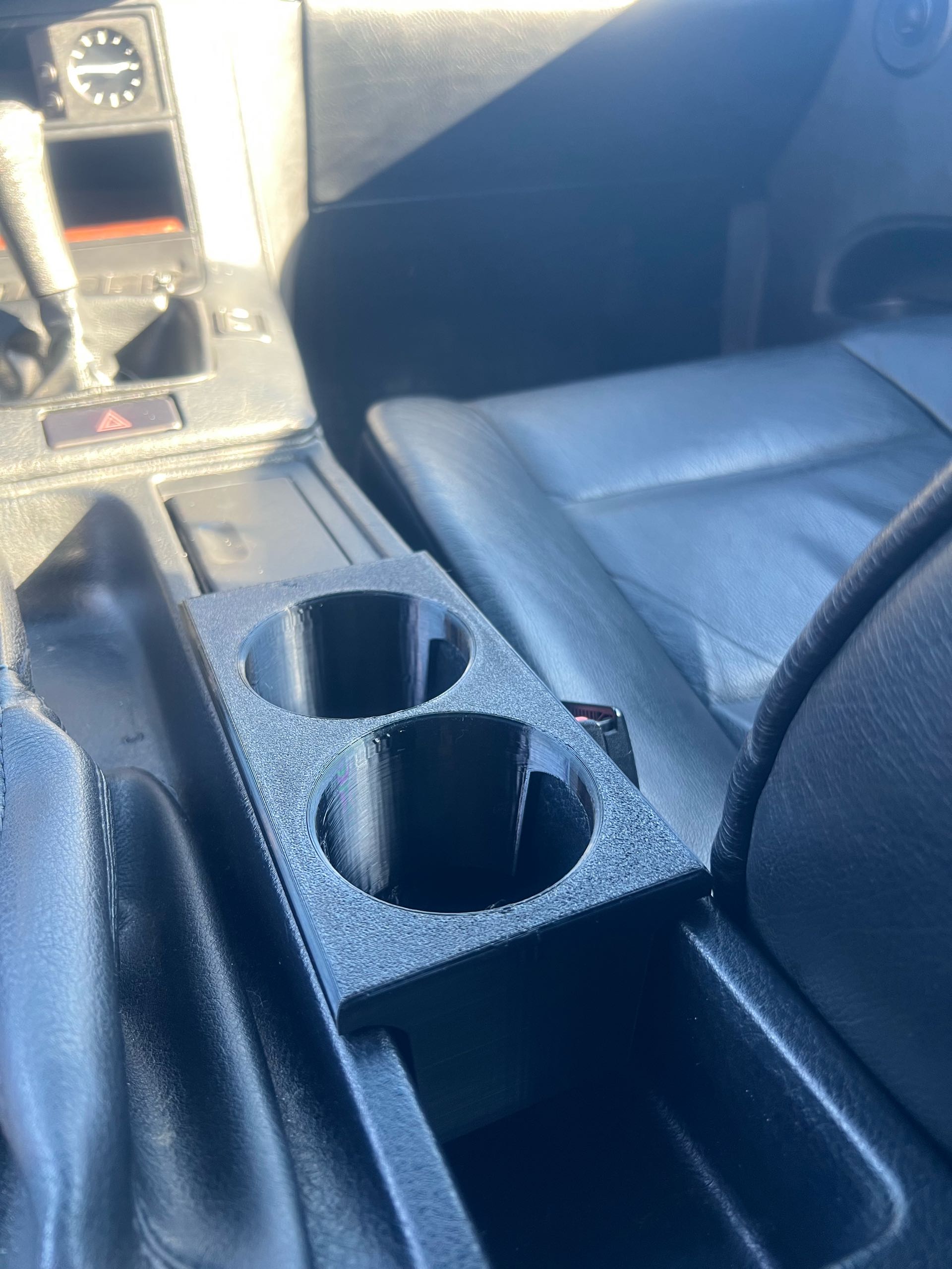 BMW E36 puodelių laikiklis (išskyrus Compact modelius)