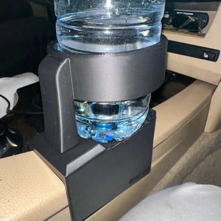 BMW E60/E61 puodelių laikiklis