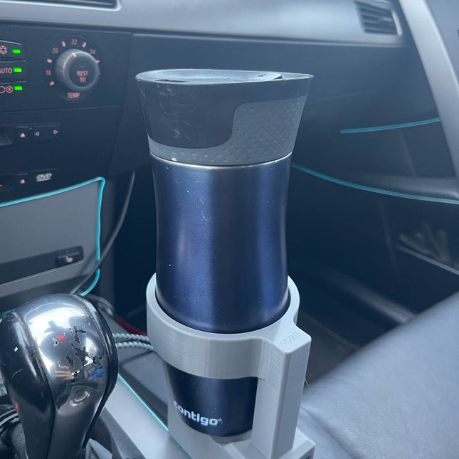 BMW E60/E61 puodelių laikiklis