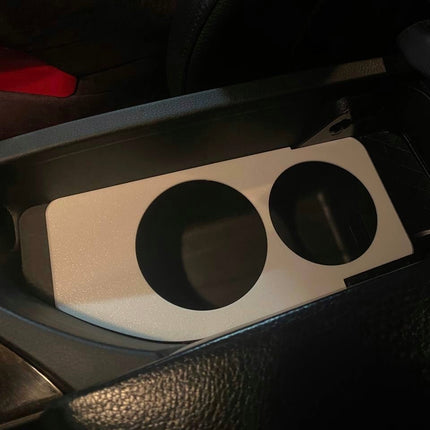 BMW E60/E61 puodelių laikiklis