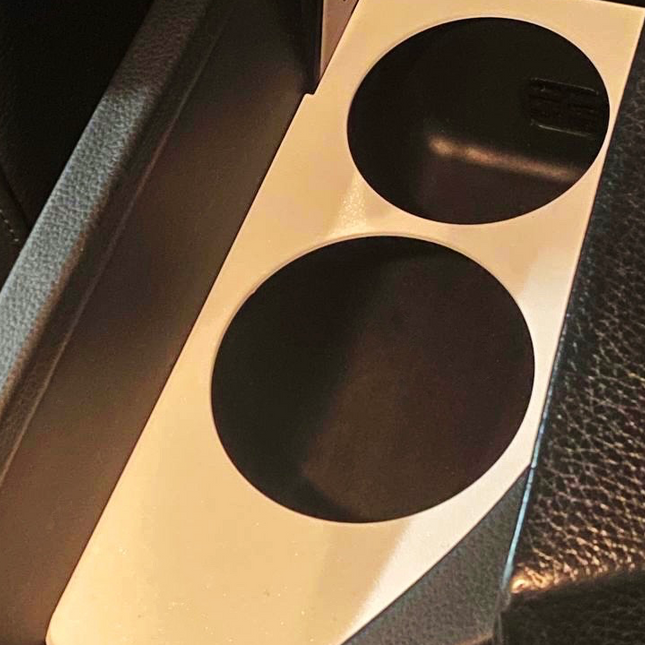 BMW E60/E61 puodelių laikiklis