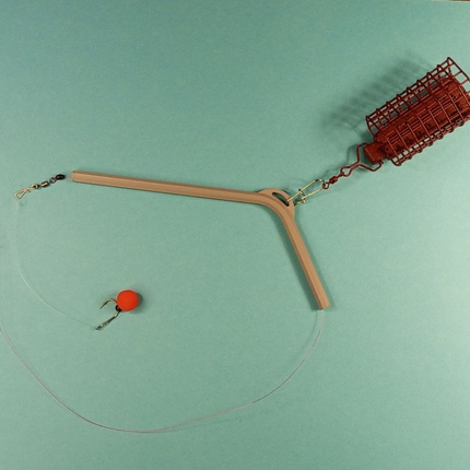 Antisusipainiojantis laikiklis fideriui (Anti-Tangle Boom)